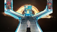 an image of a stairway with a statue on it